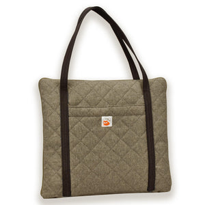 Travel dog bed. Portable dog bed. Folded, zips closed. Carried by long shoulder straps, handles. Ideal for restaurants. Beige 