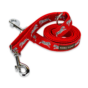 Zebras on a field of red make up the eye-catching pattern on the KONA CAVE® Dog Leash
