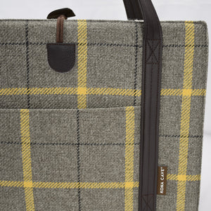 Close up of front pocket, reinforced shoulder straps and one handed toggle closure details on the front of the KONA CAVE® Travel Dog Bed in Grey Beige Country Plaid with Yellow