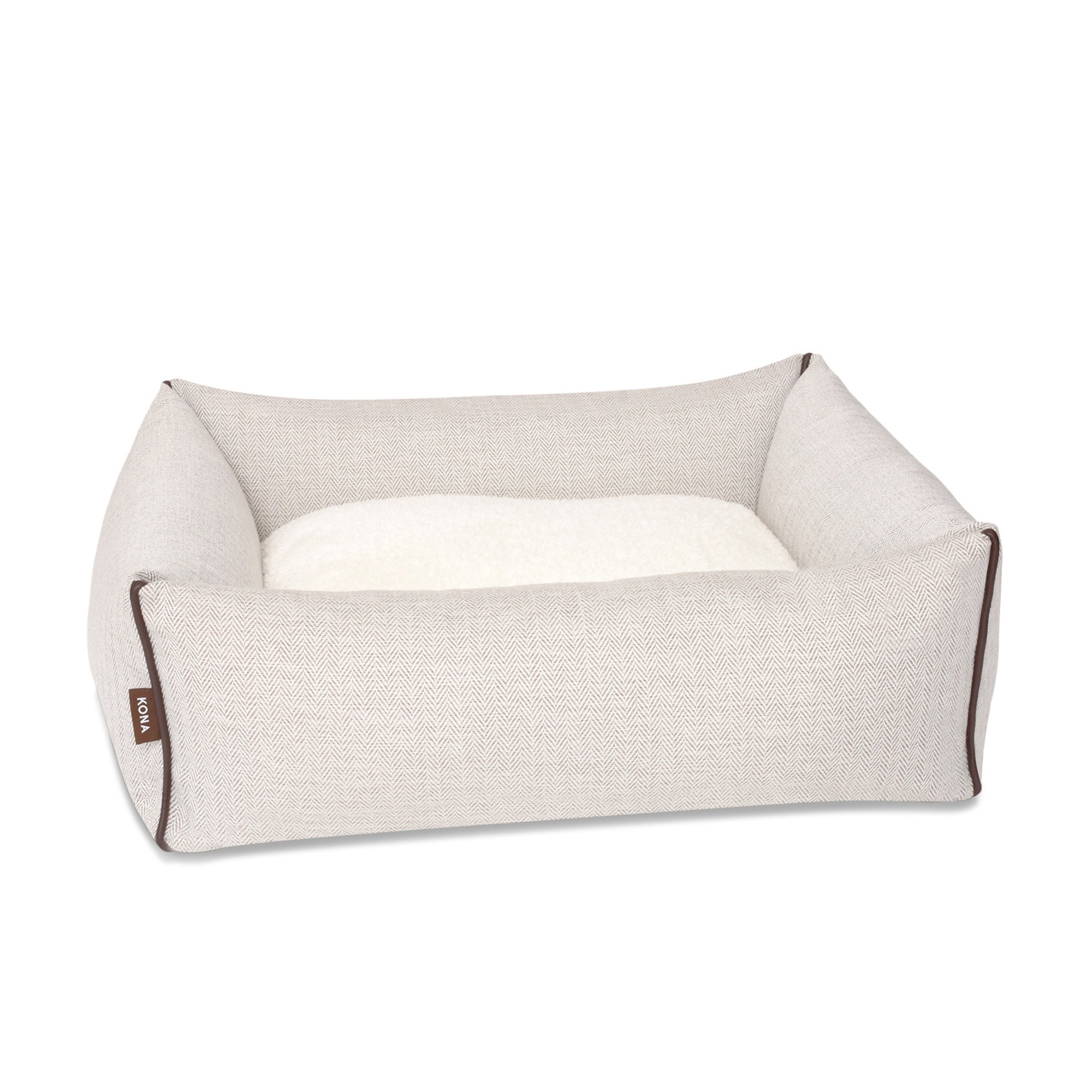 KONA CAVE® luxury bolster dog bed in elegant cream herringbone fabric with leather trim